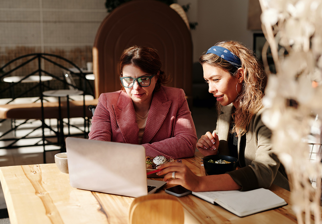 two people working on computer