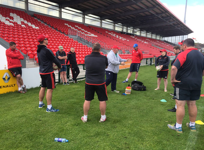 Colin Moran on a rugby pitch instructing development staff