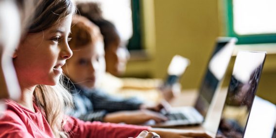 Students in front of laptops