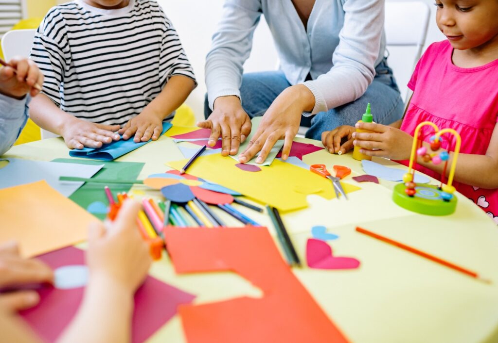 A group of kids are doing handicrafts