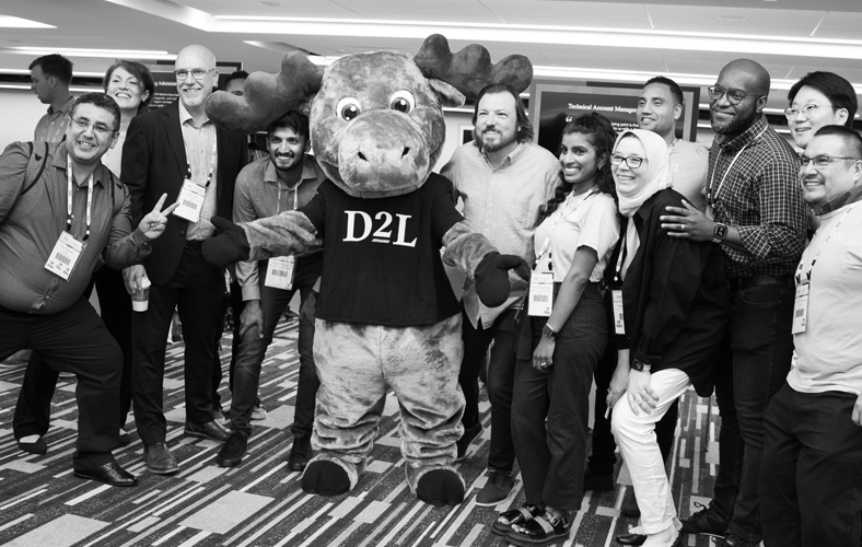 D2L Fusion 2022 attendees with Moose