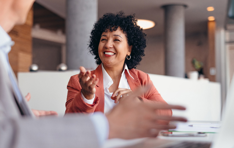 Women speaking in a meeting